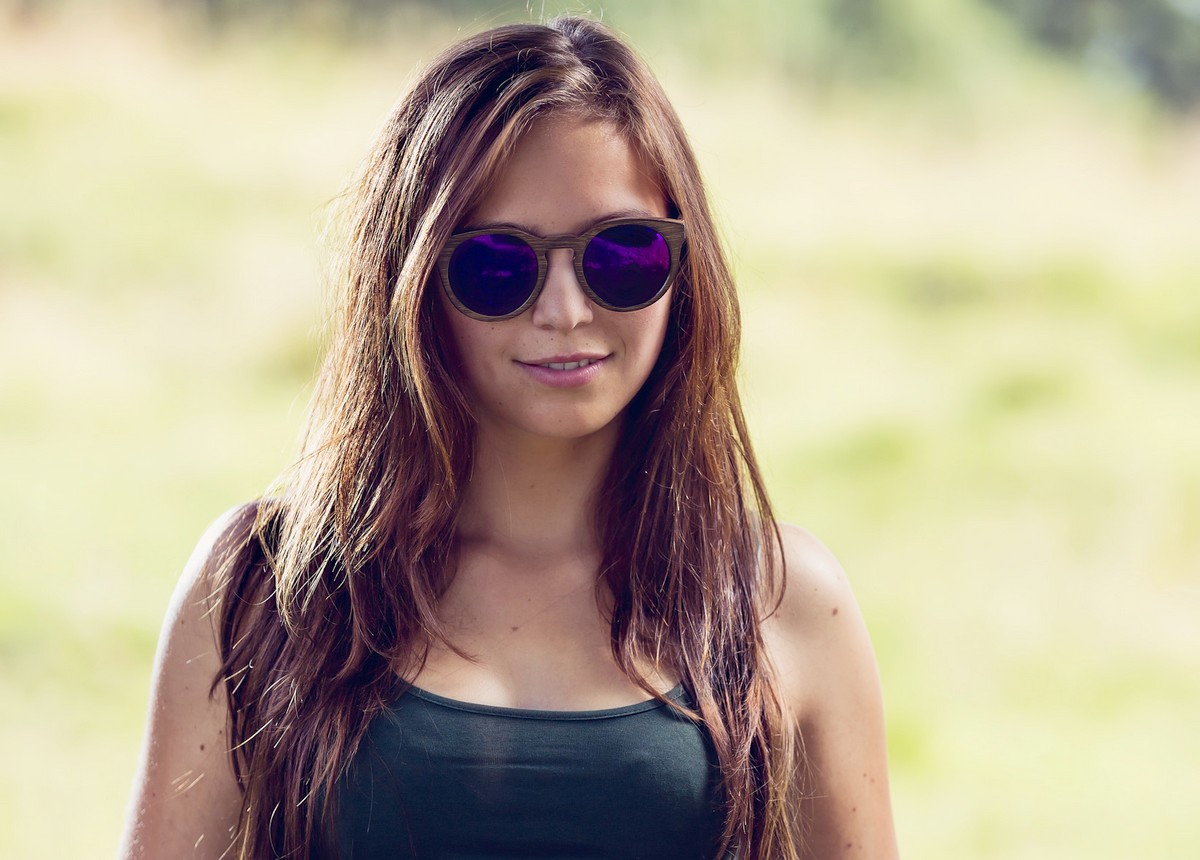 Dark Bamboo Sunglasses for Women - Girls - Purple Lenses. (Photo: Elena Ernst)
